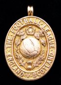 A 15ct. gold Football League representative medal,
inscribed THE FOOTBALL LEAGUE, ENGLAND v