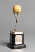 A trophy for the course record set by Peter Alliss at La Moye Golf Club in Jersey,
the trophy plaque