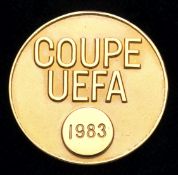 A 1983 UEFA Cup winner's medal awarded to the RSCA Anderlecht reserve goalkeeper Dirk Vekeman,
in