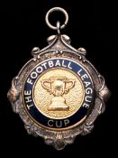 A silver & enamel 1991 Football League Cup runners-up medal awarded to Mal Donaghy,
inscribed THE