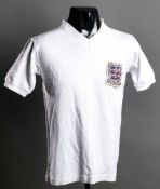 John Talbut: a white England No.5 U-23 international jersey season 1963-64,
short-sleeved,