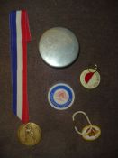 A miscellany of tennis badges, medals, key-rings, presentations etc.,
including issues for the