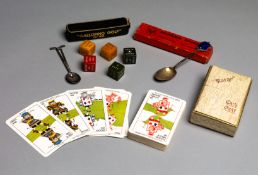 A boxed sterling silver golf spoon,
together with another silver spoon; a golf card game "Kargo";