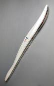 A Vancouver 2010 Winter Olympics torch,
designed by Leo Obstbaum, stainless steel, aluminium, &