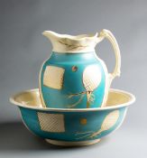 A pottery jug and wash-bowl, probably American, circa 1895,
large and impressive and  lawn tennis