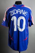 A replica France international football jersey signed by Zinadine Zidane, signed in black marker pen