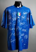 A replica Italy international football jersey signed by the 2006 World Cup winning squad, signatures