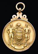 Stanley Matthews's 1953 F.A. Cup Final winner's medal,
in 9ct. gold, the reverse inscribed THE