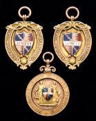 A trio of 9ct. gold & enamel Birmingham County Football Association Charity Cup medals,
i) inscribed