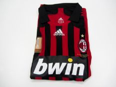 Daniele Bonera: a red & black striped AC Milan No.25 Serie A jersey season 2007-08,
short-sleeved,