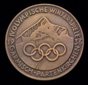 A Garmisch-Partenkirchen 1936 Winter Olympic Games participant's medal,
designed by Kunststickerei