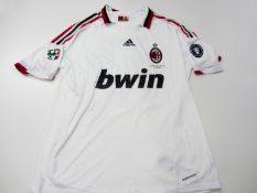Thiago Silva: a white AC Milan No.33 jersey season 2009-10,
short-sleeved, the reverse lettered T.