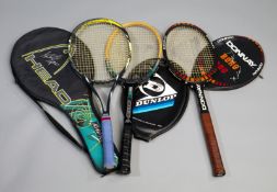 Tennis racquets signed on the head covers by champions Andre Agassi, Bjorn Borg & John McEnroe,
a