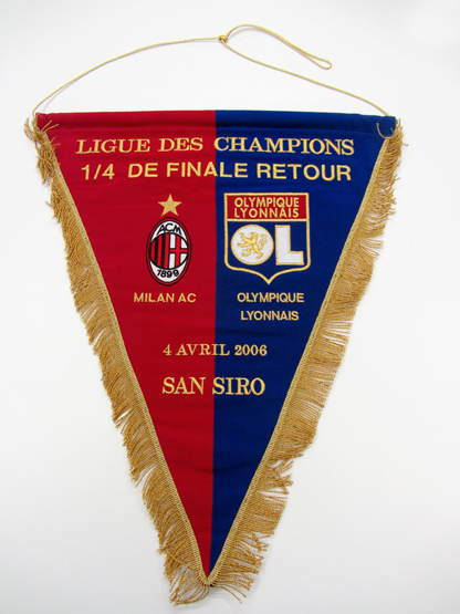 A pennant for the AC Milan v Lyon UEFA Champions League quarter-final match 4th April 2006
