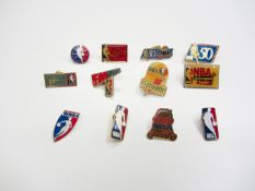 A collation of 47 various basketball pins, mostly relating to the NBA teams, but also FIBA, Hall of