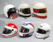 Val Musetti race worn 1980s AGV helmet and two `Formula One Racewear` racesuits, a red and white