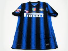 Eto`o: a blue & black striped FC Inter No.9 jersey prepared for the 2010 FIFA Club World Cup semi-