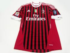 Kevin-Prince Boateng a red & black striped AC Milan No.27 Serie A jersey season 2011-12, short-