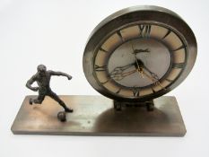 A desk clock with football design Provenance: Torino Olympic Stadium Museum of Sport