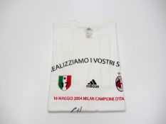 A t-shirt signed by the AC Milan`s 17th `Scudetto` team of 2003-04 Provenance: Former Director of