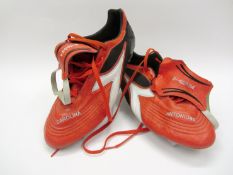 Antonio Cassano: a pair of orange, black & white Diadora football boots 2013, inscribed CAROLINA &