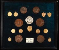 A display of electrotypes of sports medals & badges presented to A. Fattorini, including 8 pairs