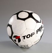 A football signed by Pele, signed at the World Travel Market in London in 1985 when Pele was an