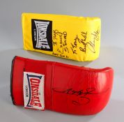 A boxing glove double-signed by Emanuel Steward & Thomas `Hitman` Hearns, a yellow left-hand