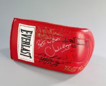 A multi-signed boxing glove, a red Everlast right-hand glove signed in a mixture of black, gold &