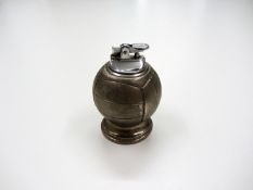 A table cigarette lighter with football design 11cm., 4 1/4in. Provenance: Torino Olympic Stadium