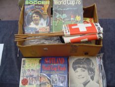 A miscellany of World Cup ephemera, books, brochures, postcards, first day covers, badges,