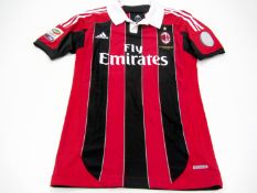 Stephan El Shaarawy: a red & black striped AC Milan No.92 Serie A jersey season 2012-13, short-