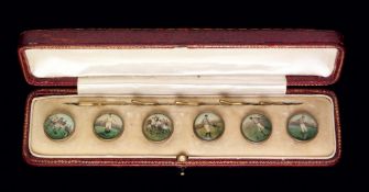 A cased set of six Edwardian gentlemen`s waistcoat buttons set with coloured prints of football and