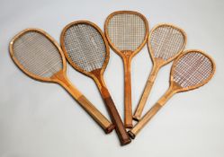 Five convex wedge tennis racquets, including a Doherty, an Ajax and an Excelsior