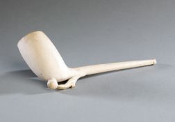 A large Victorian clay smoker`s pipe with football design, the rest formed with a stocking and boot