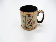 A Gibson`s of Staffordshire china tankard with football decoration Provenance: Torino Olympic