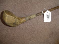 An A.H. Scott of Elie patent spliced neck brassie circa 1920, poor condition, original hickory