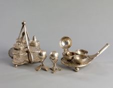 A group of electroplated tableware with tennis designs,
comprising: two cruet sets, the first by