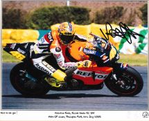 Valentino Rossi and other motorcycle champion signed items,
comprising two limited edition Keith