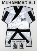 A Muhammad Ali signed fight robe,
signed in black marker pen, mounted in a frame under Plexiglas