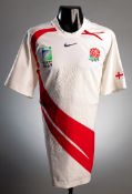 A Simon Shaw white England No.4 2007 Rugby World Cup shirt,
short-sleeved, gold Webb-Ellis trophy to