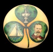 A very rare Americas Cup pin badge probably relating to the 1899 race,
tin, with shamrock design
