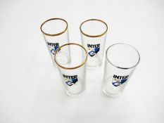 Four souvenir drinking glasses bearing the FC Inter crest

Provenance: Torino Olympic Stadium Museum