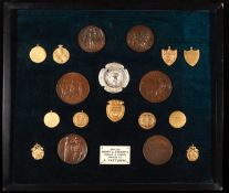 A display of electrotypes of sports medals & badges presented to A. Fattorini,
including 8 pairs