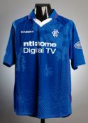 Neil McCann: a blue Rangers No.17 jersey season 2002-03,
short-sleeved, Bank of Scotland Premier