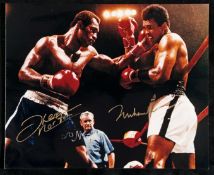 A double-signed Muhammad Ali v Ken Norton photograph,
8 by 10in., both signatures in gold marker