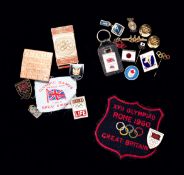 A collection of 19 Olympic medals and badges relating to the career of John Wardley, the former