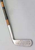 A Bobby Jones autograph Spalding Pro-Flite Calamity Jane rustless putter 1930s,
repairs to hickory