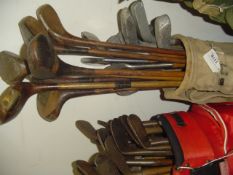 20 hickory shafted golf clubs,
comprising 7 socket head woods, 9 aluminium headed clubs and 4 marked