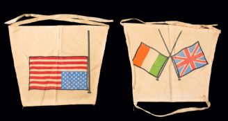 A pair of Ryder Cup caddie's tabards,
one with the US Stars and Stripes, the other with Union Jack &